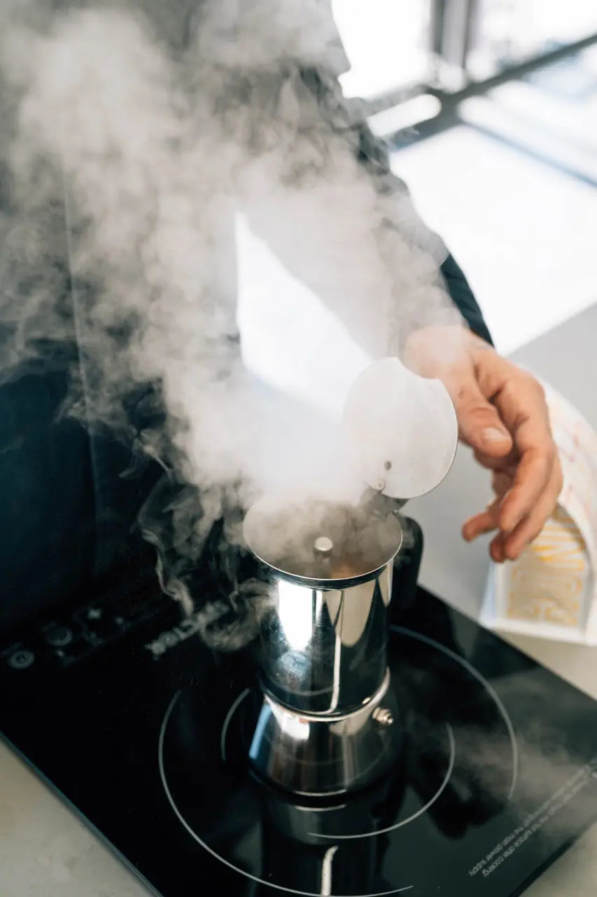 Brewing Coffee with a stove top coffee brewer.