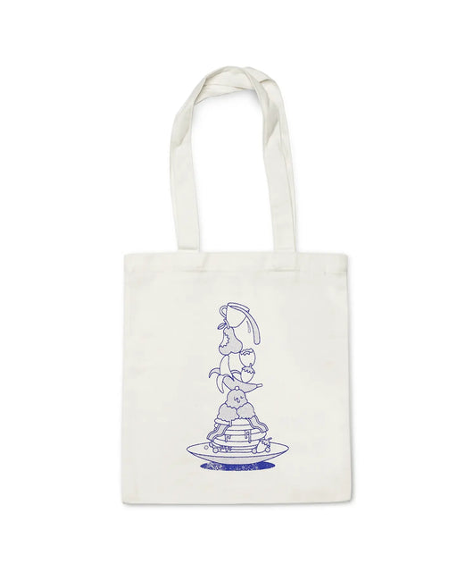 White "Breakfast Club" tote bag with blue text - stylish and functional for carrying coffee beans. Elevate your daily routine with this unique design. Perfect for coffee lovers on the go.